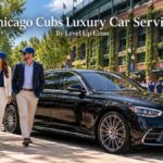 Chicago Cubs luxury car service with a black Mercedes S-Class and chauffeur outside a historic brick ballpark on a sunny afternoon