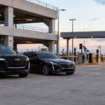O'Hare and Midway airport parking pricing guide with black luxury SUV and sedan at an airport parking garage